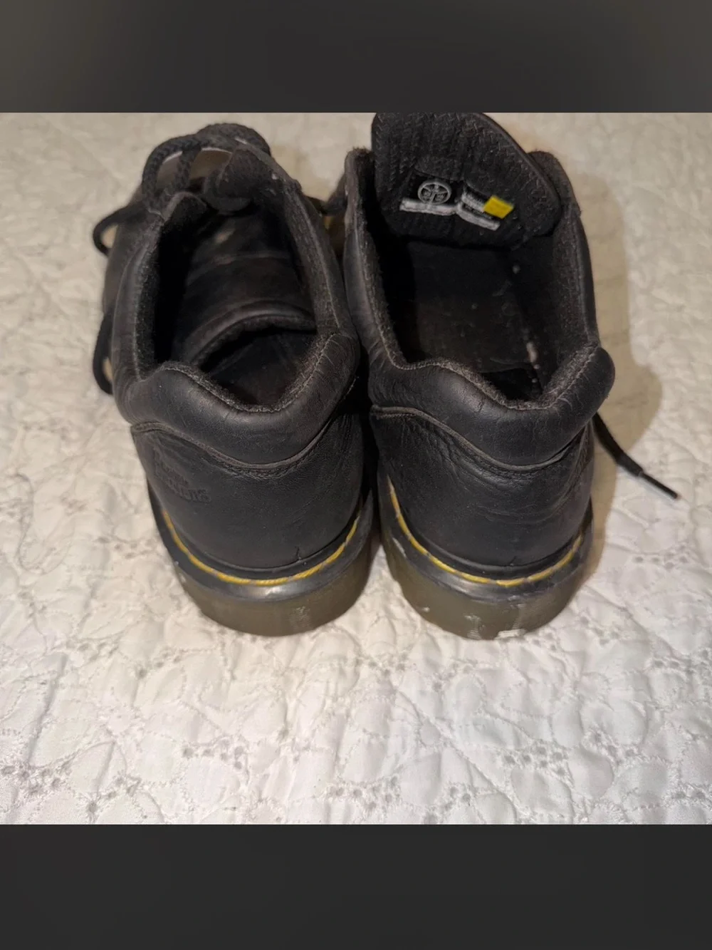 Dr. Martens Black Leather Low-Top Sneakers with Yellow Welt Stitch